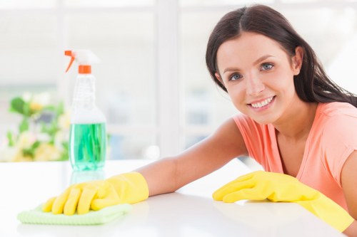 Carpet cleaning technician working safely in a Hampstead property