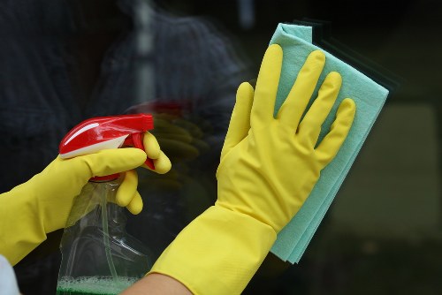 Carpet cleaning team following safe working practices