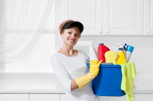 Cleaning technician preparing equipment for a carpet cleaning service